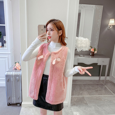 Vestă modernă de damă în alb, roz și verde