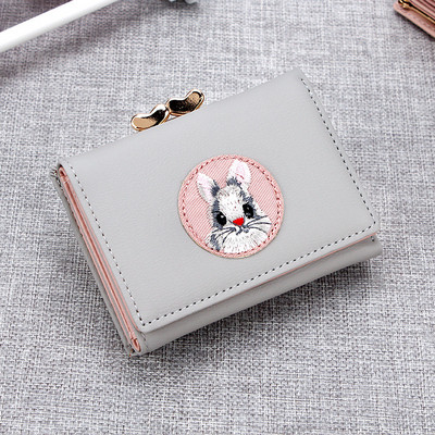 Γυναικείο πορτοφόλι με κέντημα και μεταλλικό κούμπωμα