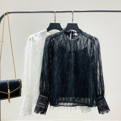 Γυναικεία μπλούζα με στρογγυλό ντεκολτέ σε μαύρο και άσπρο χρώμα