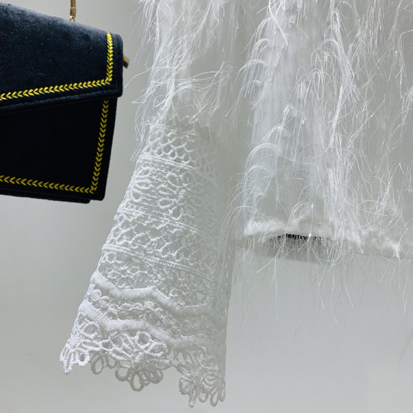 Γυναικεία μπλούζα με στρογγυλό ντεκολτέ σε μαύρο και άσπρο χρώμα