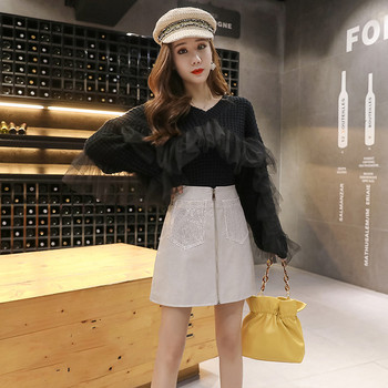 Σύγχρονη γυναικεία φούστα δερματίνι με φερμουάρ και τσέπες