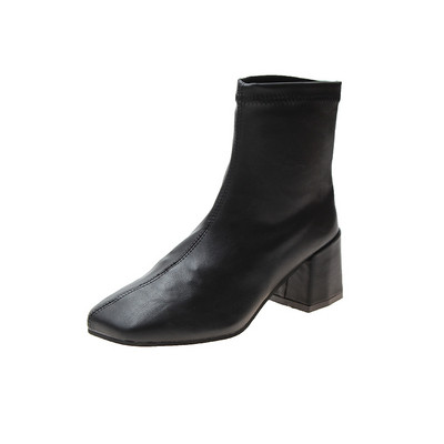 Fekete-fehér műbőr női csizma