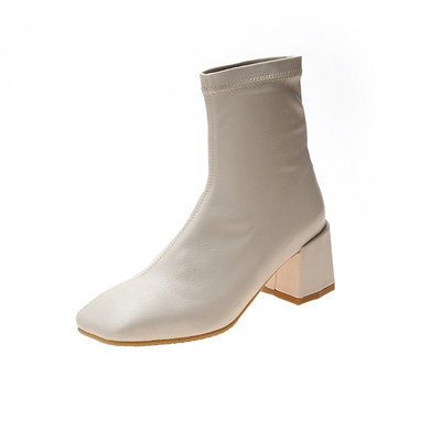 Fekete-fehér műbőr női csizma