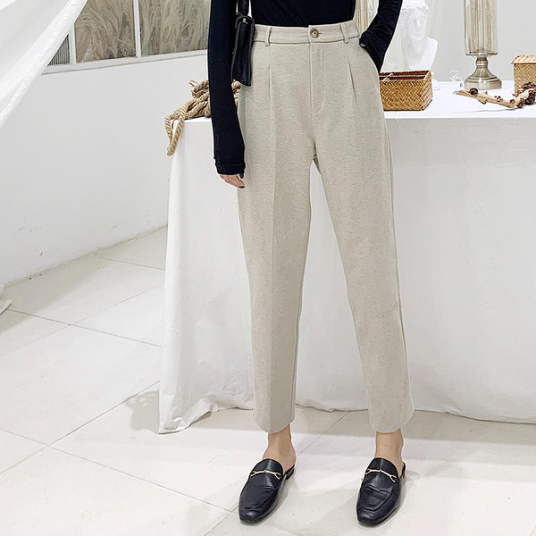 Μοντέρνα γυναικεία παντελόνια με ψηλή μέση με μήκος 9/10 σε μαύρο και μπεζ χρώμα