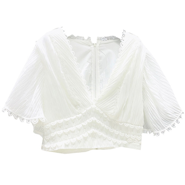 Bluză de damă cu decolteu spitz în alb-negru