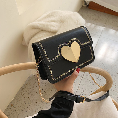 Geanta de dama moderna cu element metalic in patru culori