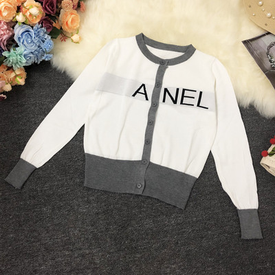 Γυναικεία ζακέτα με κουμπιά και τέσσερα χρώματα