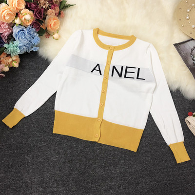 Γυναικεία ζακέτα με κουμπιά και τέσσερα χρώματα