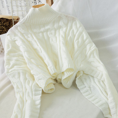 Rövid női pulóver magas gallérral, sárga, fehér és fekete színben