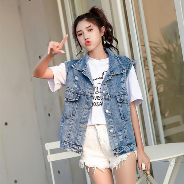 Vesta de dama model nou din denim cu broderie colorata in albastru