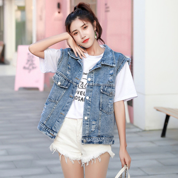 Vesta de dama model nou din denim cu broderie colorata in albastru