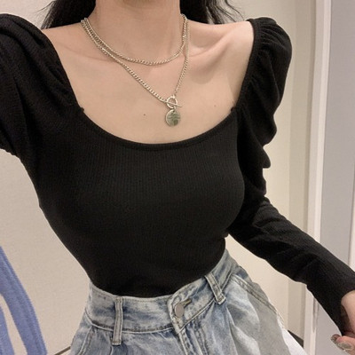 Bluză de damă modernă cu decolteu rotund în alb-negru