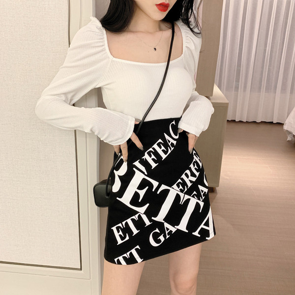 Bluză de damă modernă cu decolteu rotund în alb-negru