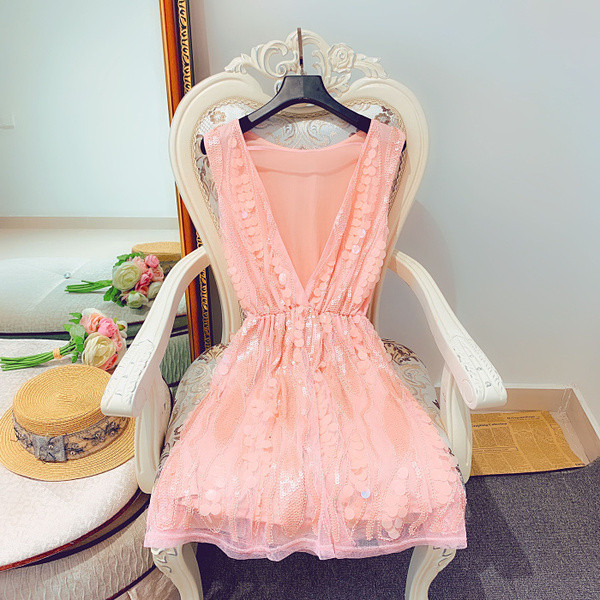 Stílusos női ruha flitterekkel, több színben