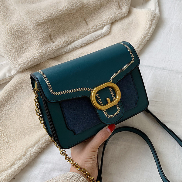 Geanta de dama moderna cu catarama in mai multe culori