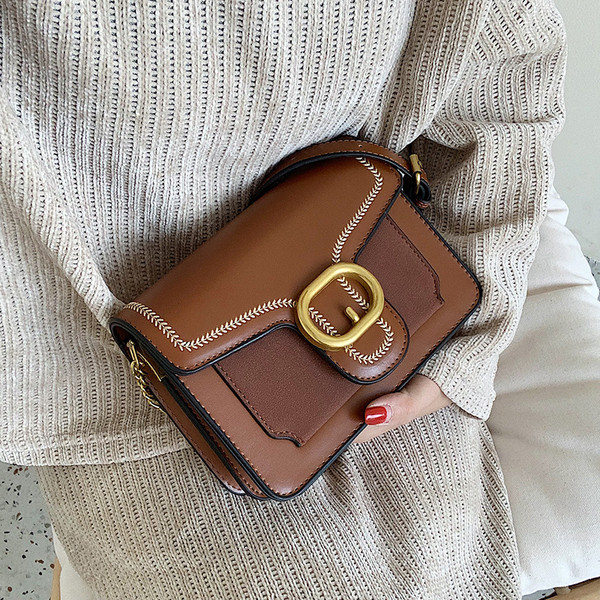 Geanta de dama moderna cu catarama in mai multe culori