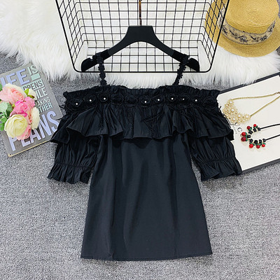 Bluză de damă cu element 3D în negru, alb și galben