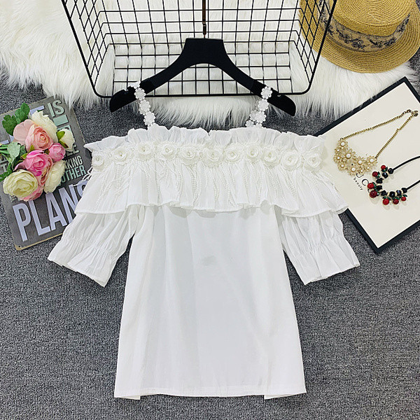 Bluză de damă cu element 3D în negru, alb și galben