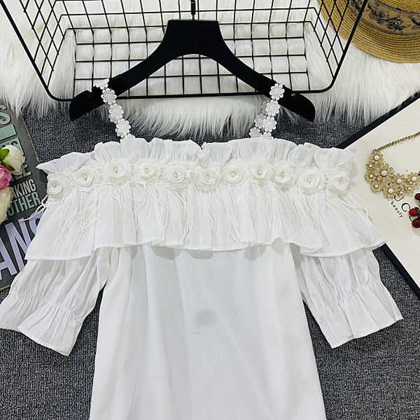 Bluză de damă cu element 3D în negru, alb și galben