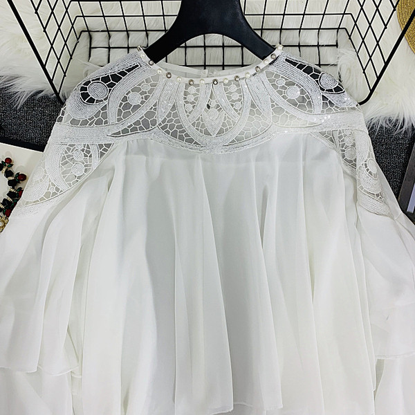 Bluza de dama cu paiete model lat in alb si negru