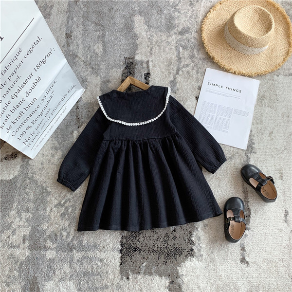 Rochie pentru copii cu guler si nasturi de culoare neagra