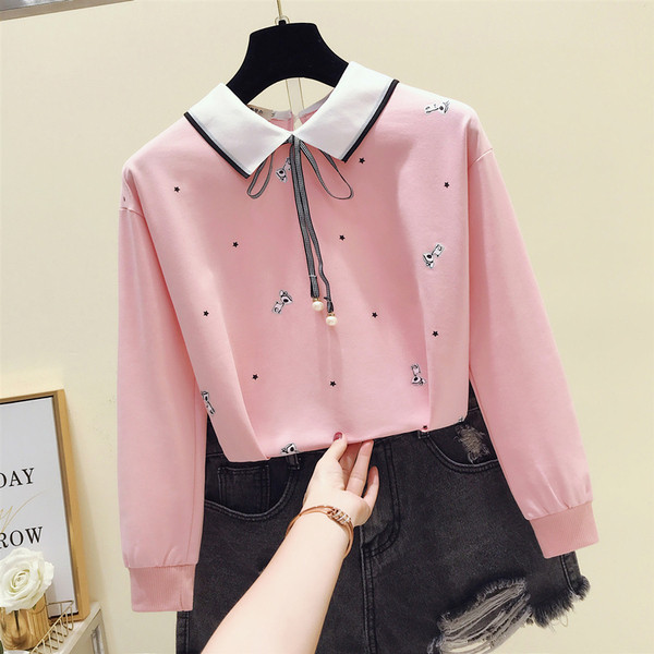 Bluză de damă modernă cu panglică și broderie în albastru, roz și alb