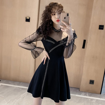 Rochie de dama moderna model decupata cu decolteu in negru