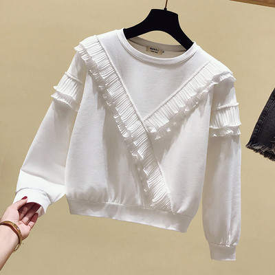 Bluză de damă cu mâneci lungi și decolteu O în alb și negru