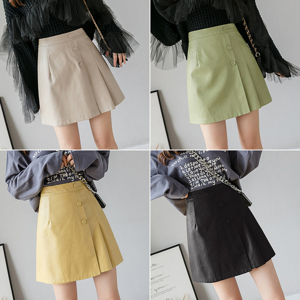 Fusta de dama moderna cu talie inalta si nasturi din piele ecologica in bej, verde, galben si negru