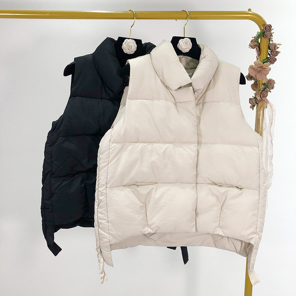 Плътен асиметричен елек в бял и черен цвят