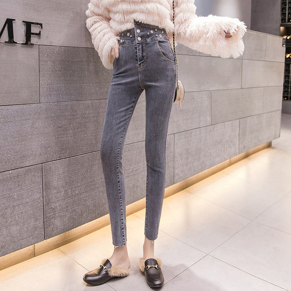 Blugi de dama actuali Model Slim - talie inalta cu elemente metalice in albastru