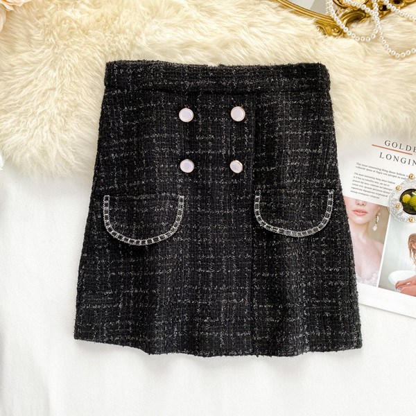 Κομψή μαύρη γυναικεία φούστα με ψηλή μέση με κουμπιά 