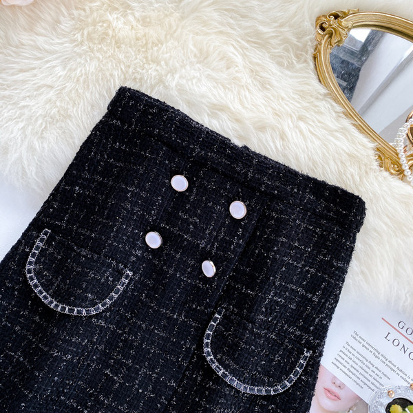 Κομψή μαύρη γυναικεία φούστα με ψηλή μέση με κουμπιά 