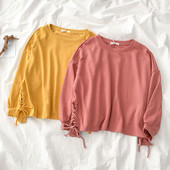 Μοντέρνα γυναικεία μπλούζα με ωοειδές λαιμόκοψη και κορδόνια σε κίτρινο και ροζ χρώμα