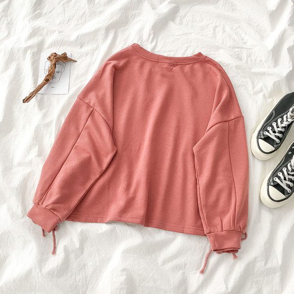 Μοντέρνα γυναικεία μπλούζα με ωοειδές λαιμόκοψη και κορδόνια σε κίτρινο και ροζ χρώμα