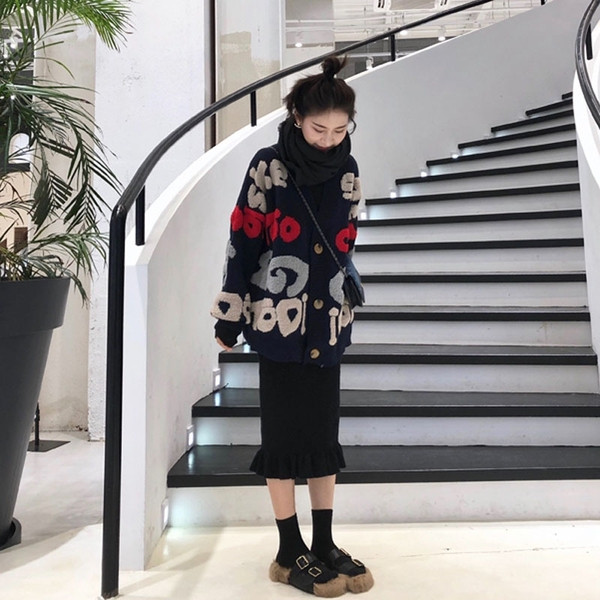 Γυναικεία ζακέτα χειμωνιάτικη με πολύχρωμα κεντήματα