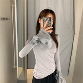 Bluză de damă mulata, cu guler înalt și mâneci tăiate de culoare gri