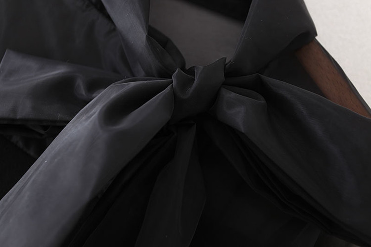 Γυναικεία φαρδύ  μπλούζα με διαφανές κομμάτια και κορδέλα