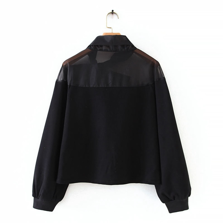 Γυναικεία φαρδύ  μπλούζα με διαφανές κομμάτια και κορδέλα