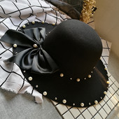 Κομψό γυναικείο καπέλο με πέρλες και κορδέλα