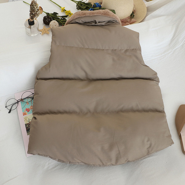 Női mellény pehelygallérral és zsebekkel több színben