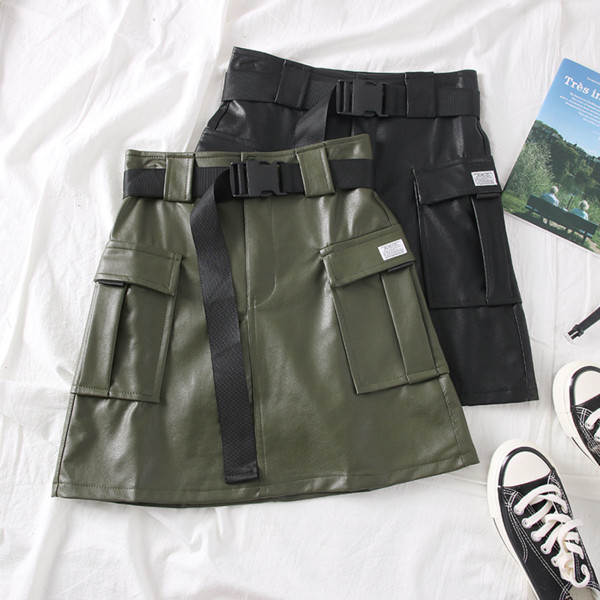 Fusta de dama actuala cu buzunare si curea din piele ecologica in verde si negru