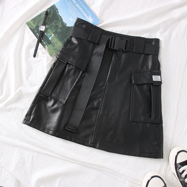 Fusta de dama actuala cu buzunare si curea din piele ecologica in verde si negru