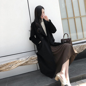 Női kabát hosszú és széles modell bézs és fekete színben