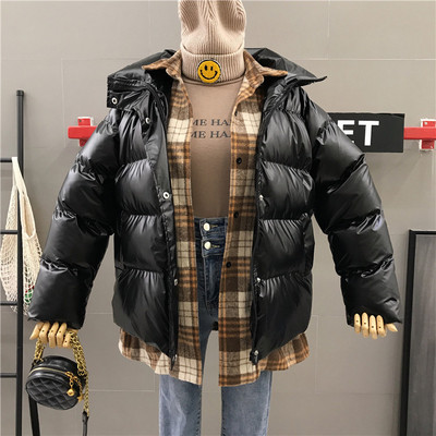 Χειμερινό γυναικείο μπουφάν με τσέπες σε μαύρο και ασημί χρώμα