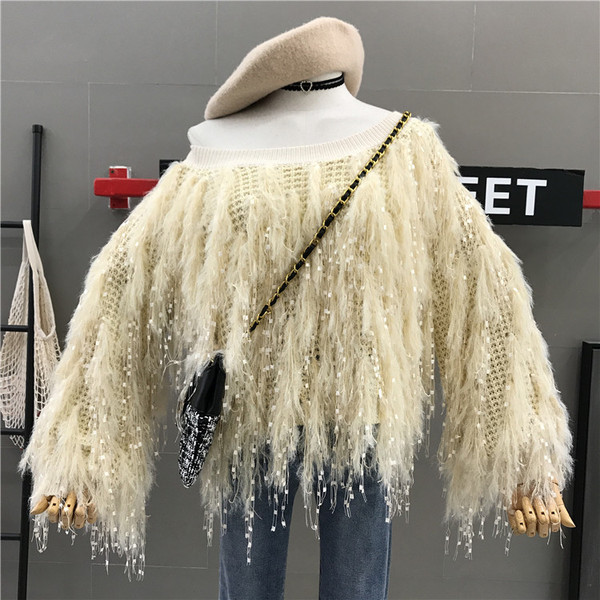 Νέο μοντέλο γυναικείο πουλόβερμε μανίκια πτώσης σε μαύρο και άσπρο χρώμα