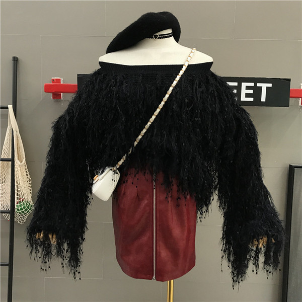 Νέο μοντέλο γυναικείο πουλόβερμε μανίκια πτώσης σε μαύρο και άσπρο χρώμα