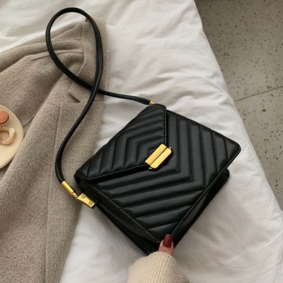 Geanta de dama eleganta din piele cu inchidere metalica in mai multe culori