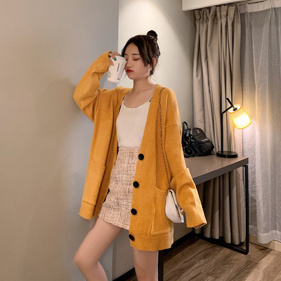 Μοντέρνα γυναικεία ζακέτα με τσέπες και κουμπιά σε μπλε και κίτρινο χρώμα