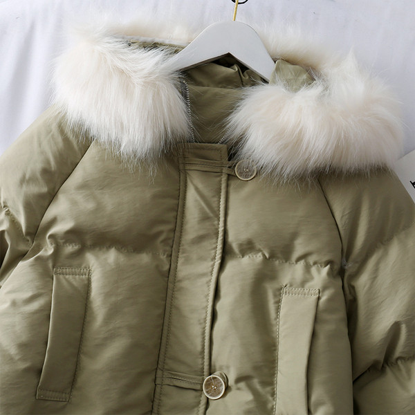 Μοντέρνο χειμωνιάτικο γυναικείο μπουφάν με  γούνα και κουκούλα σε δύο χρώματα